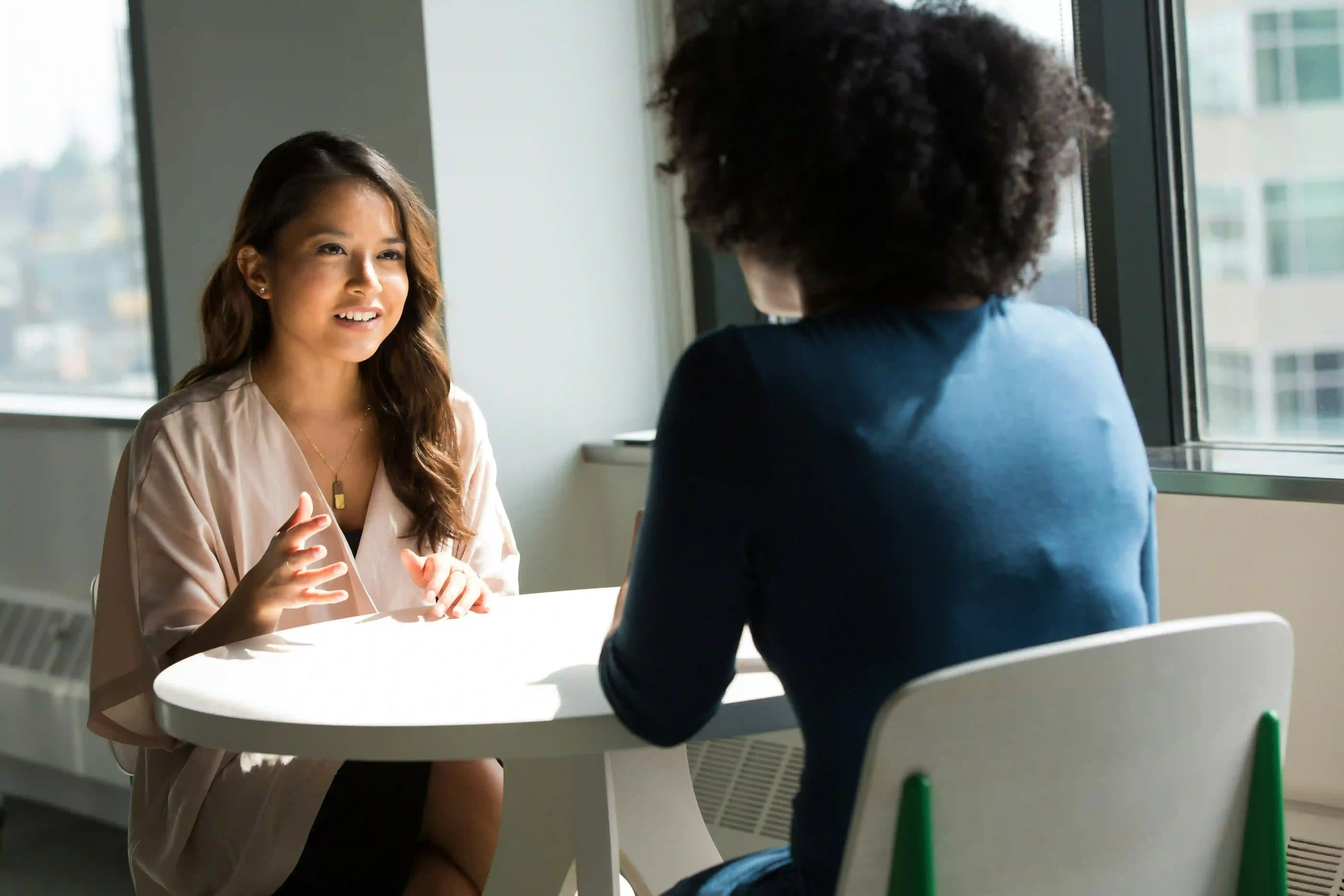 An image is showing a team strategizing client-oriented eCommerce solutions.