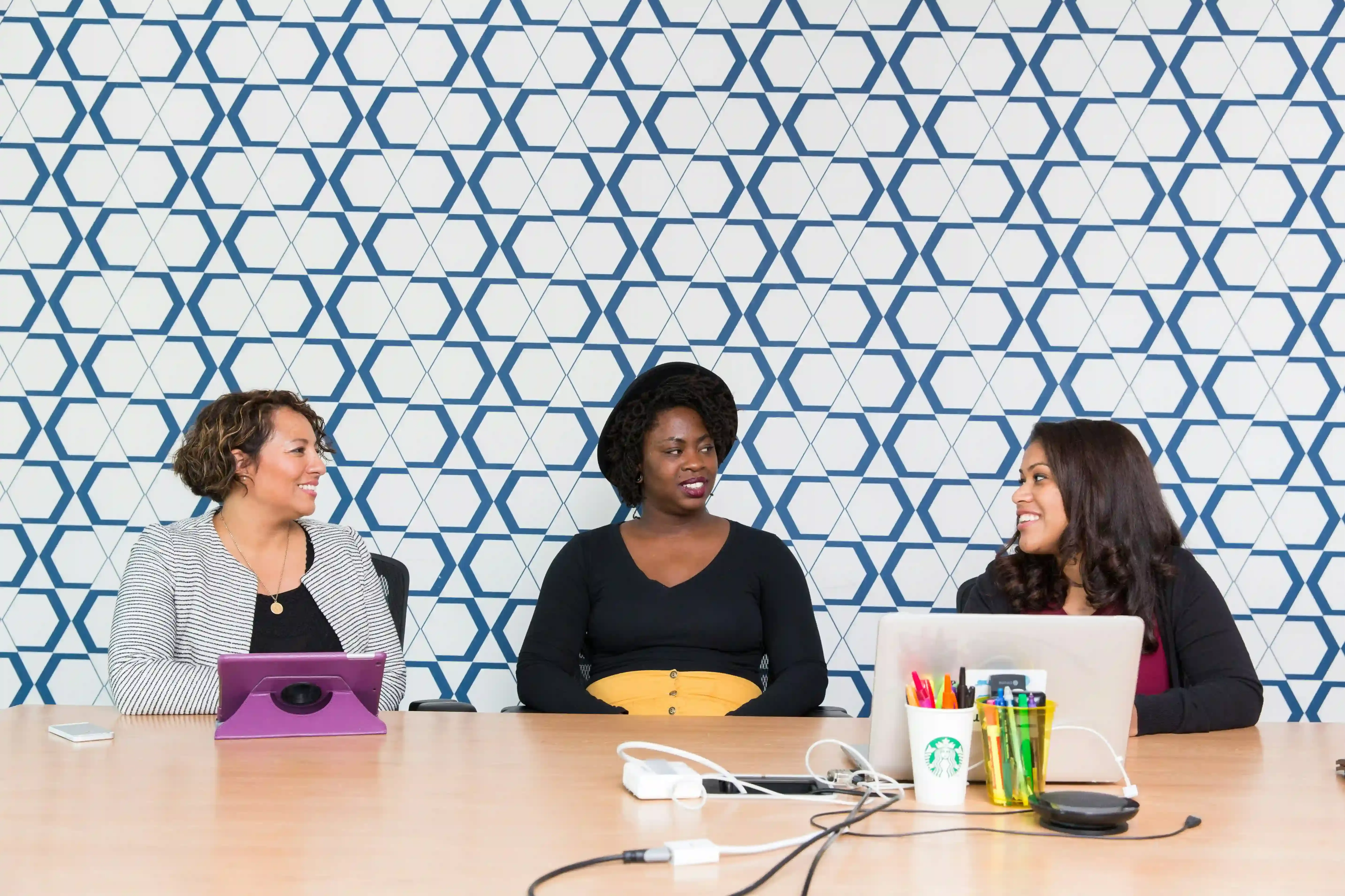An image is showing experts collaborating to solve challenges.